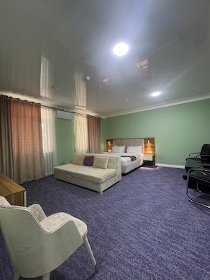 Quarto casal luxo | Área de estar