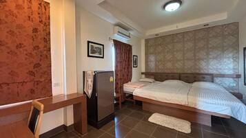 Standard Triple Room, City View | Desk, laptop workspace, free WiFi