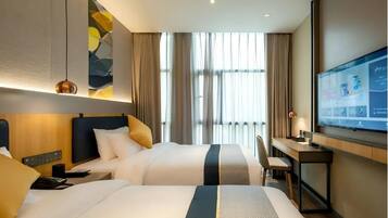 Classic Twin Room | Desk, laptop workspace, WiFi (free), bed sheets