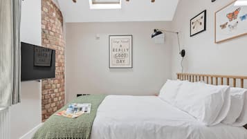 1 dormitorio, tabla de planchar con plancha, wifi gratis y ropa de cama