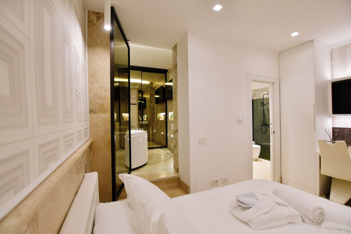 Suite Deluxe, 1 cama de matrimonio grande, no fumadores | Sábanas italianas Frette y ropa de cama de alta calidad