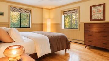 Wake up to the trees outside two big windows, with a roomy dresser to unpack your things.