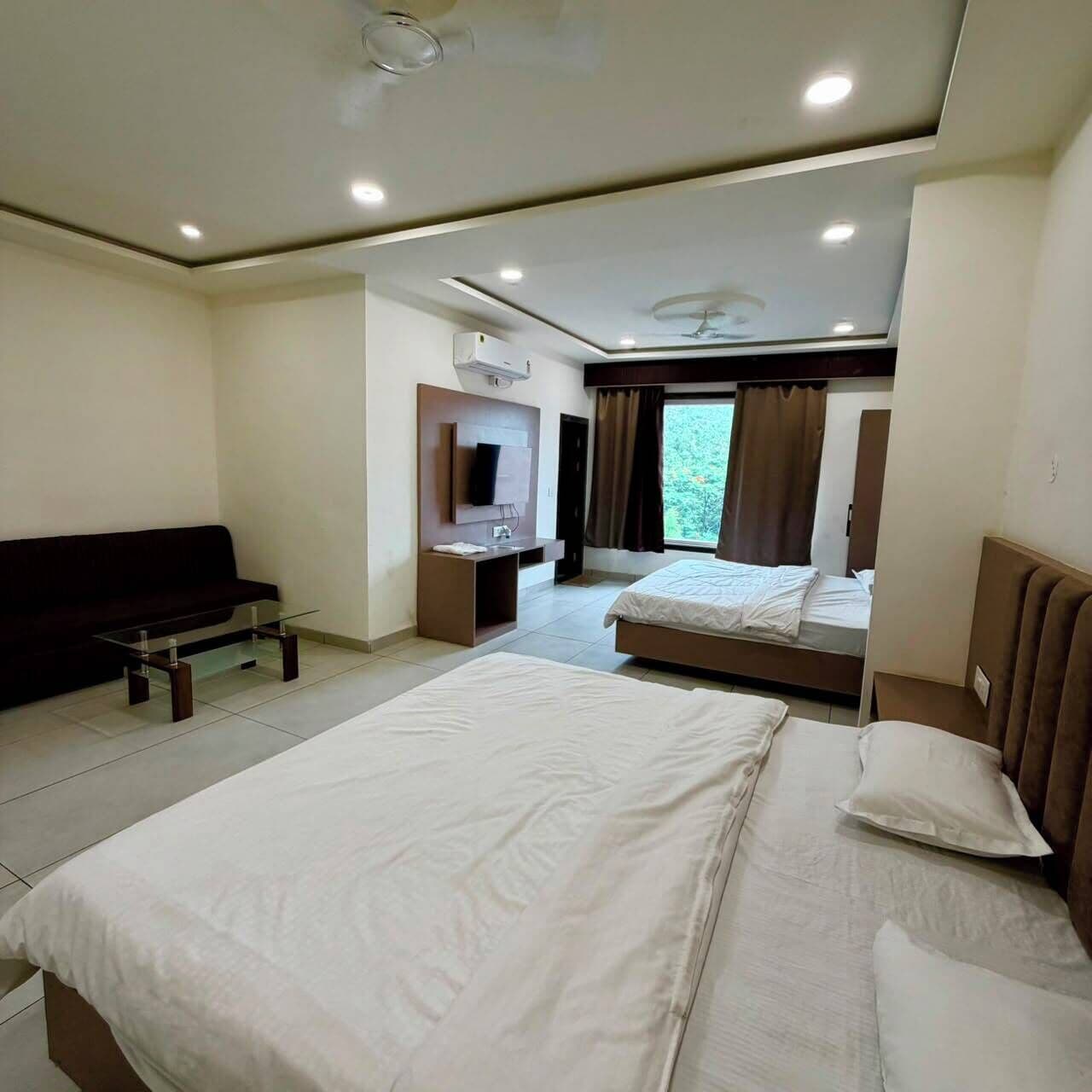 Family Quadruple Room, City View | Iron/ironing board, free WiFi