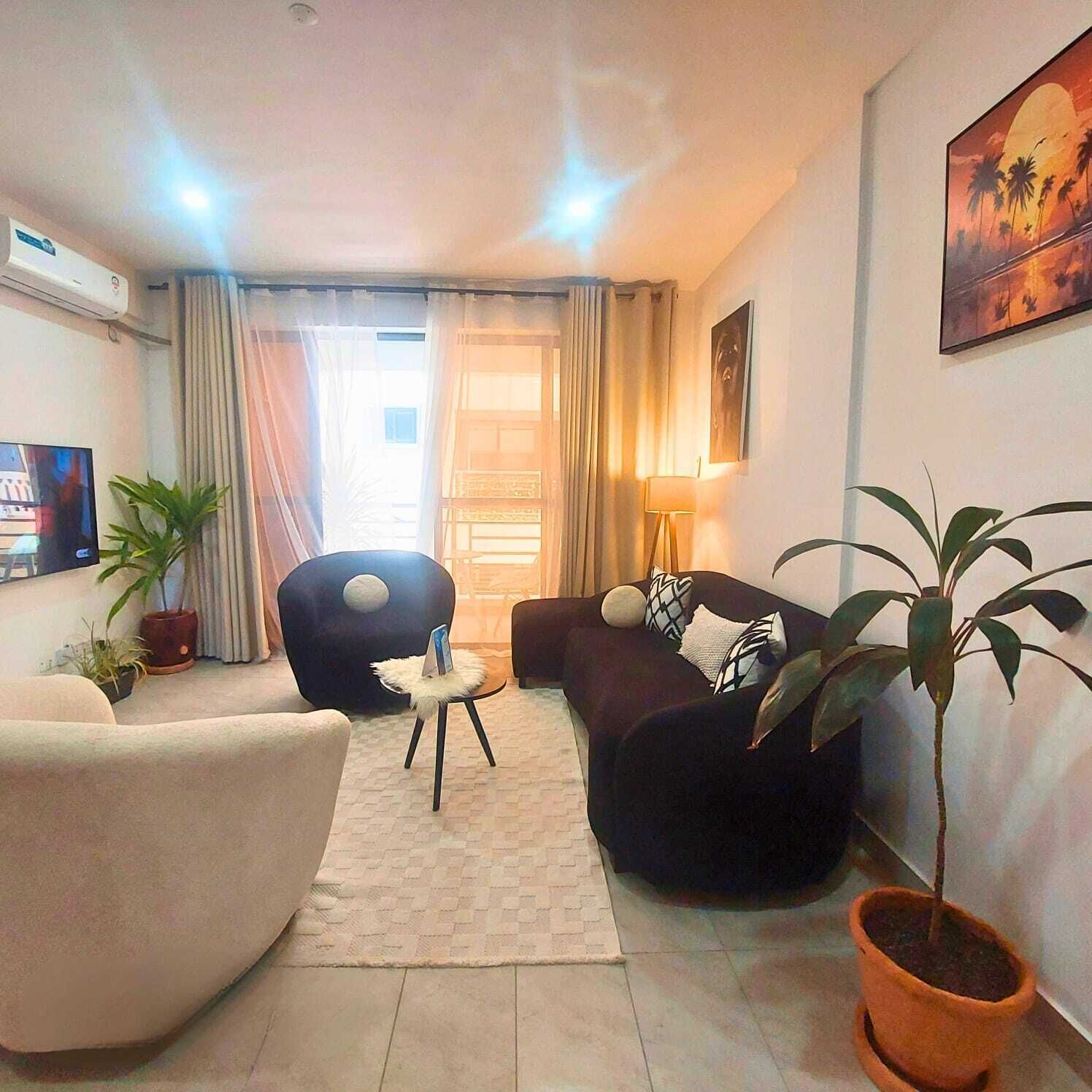 Deluxe Apartment | Living area | 32-inch Smart TV with digital channels