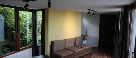 Appartement Panoramique, vue ville | Coin séjour