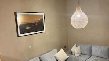 Ferienhaus, Balkon, Gartenblick | Wohnbereich