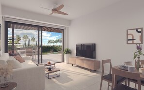 Ein modernes Wohnzimmer mit einem Flachbildfernseher, einem Sofa, einem Couchtisch und einem Essbereich mit Tisch und Stühlen.
