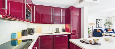 Coffee/tea maker, fridge, microwave, oven