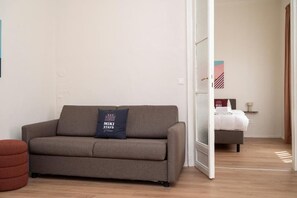 Estudio Deluxe | Área de sala de estar