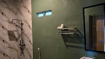 Shower, towels, soap, toilet paper