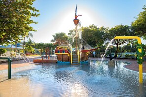 A water play area with a pirate ship structure, slides, and a pool. - Private Getaway with Outdoor Pool Access & Kitchen - Near Key Largo (Duck Key)