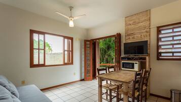 Basic Apartment | Living area | 40-inch TV with digital channels