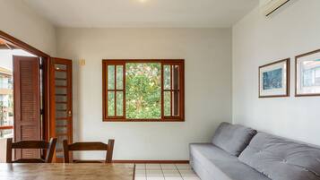 Basic Apartment | Living area | 40-inch TV with digital channels