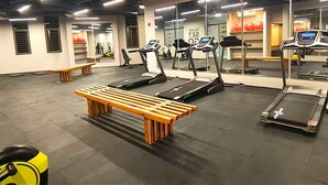 A gym with treadmills, benches, and exercise equipment. - Reserva del Mar II Apartment - Cantamar SOHO -391A (Santa Marta)