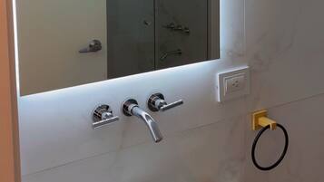 Shower, bidet, towels, soap
