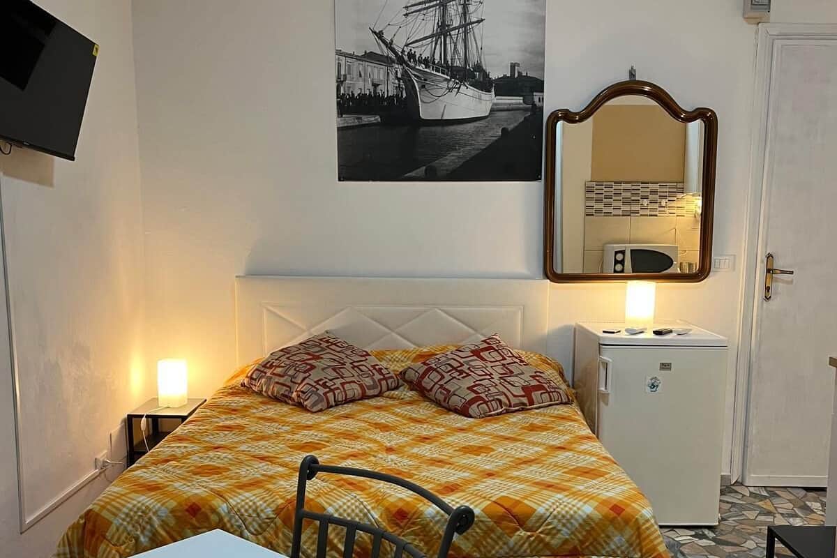 Classic Apartment, Balcony, City View | Minibar (free items), blackout drapes, soundproofing