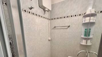 Classic Apartment, Air conditioning, Courtyard View | Bathroom | Shower, hair dryer, towels, soap