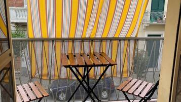 Classic Apartment, City View | Outdoor dining