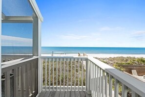 A wooden deck with a view of the beach and ocean. - Aloha House – Gulf-Front Retreat on Cape San Blas (Cape San Blas)
