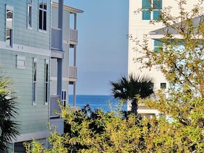 A coastal building with multiple balconies overlooking the sea. - The Lookout: North Cape, 3 Bedrooms, Pet-Friendly, Private Pool! Short walk to b (Cape San Blas)