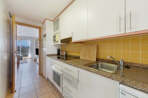 Private kitchen - Holiday Home 'Maison De Lumière' with Sea Views, Wi-Fi and Air Conditioning (Vera)