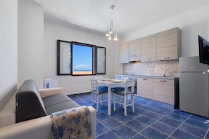 TV - Holiday Home 'Bilocale Camera E Cucina' with Sea View, Wi-Fi and Air Conditioning (La Ciaccia)