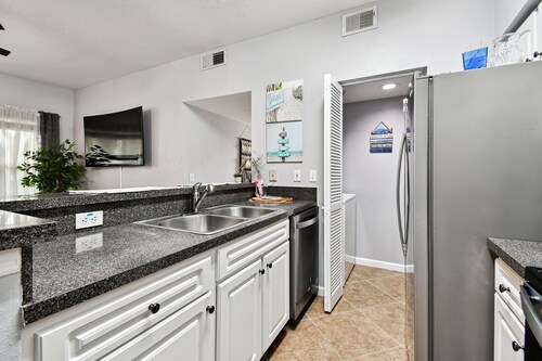 Ground floor 2 Bedroom One Bathroom Condo in gated community with Pool