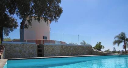 A welcoming experience set among gardens, a pool, and the Alentejo countryside