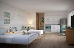 Ein modernes Hotelzimmer mit zwei Betten, einer Küchenzeile und einem Essbereich.