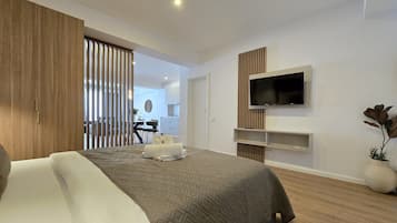 Apartemen Comfort, balkon | Setrika/meja setrika dan Wi-Fi gratis