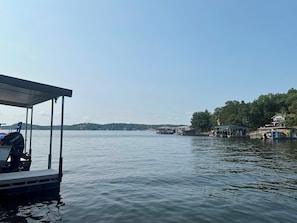 A calm lake with a dock and a covered area. - Timber Ridge - Three Bedroom House, Sleeps 8 (Village of Four Seasons)