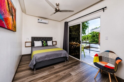 Poolside suite with private balcony in Tamarindo, self check-in