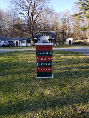 A directional sign with arrows pointing to 'Church', 'Cafe Pen', '1870 Barn', and 'Chix Coop'. - The Shop!! (Staatsburg)