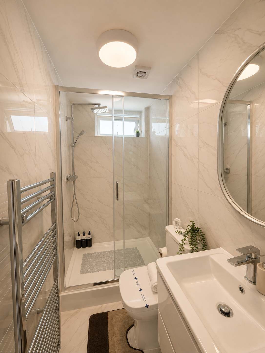 Shower, hair dryer, towels, shampoo