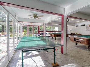 A recreational room with a foosball table, pool table, and ping pong table. - Brand NEW Luxury 3/3.5 Cabin! AMAZING VIEW! Indoor Pool, Huge Game Room, WIFI. (Gatlinburg)