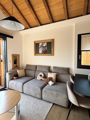 Living area - Chalet with Private Spa, Hammock, and Air Conditioning - 10 min from Gérardmer (Granges-Aumontzey)