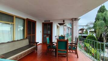 Deluxe Suite, Balcony, City View | Terrace/patio
