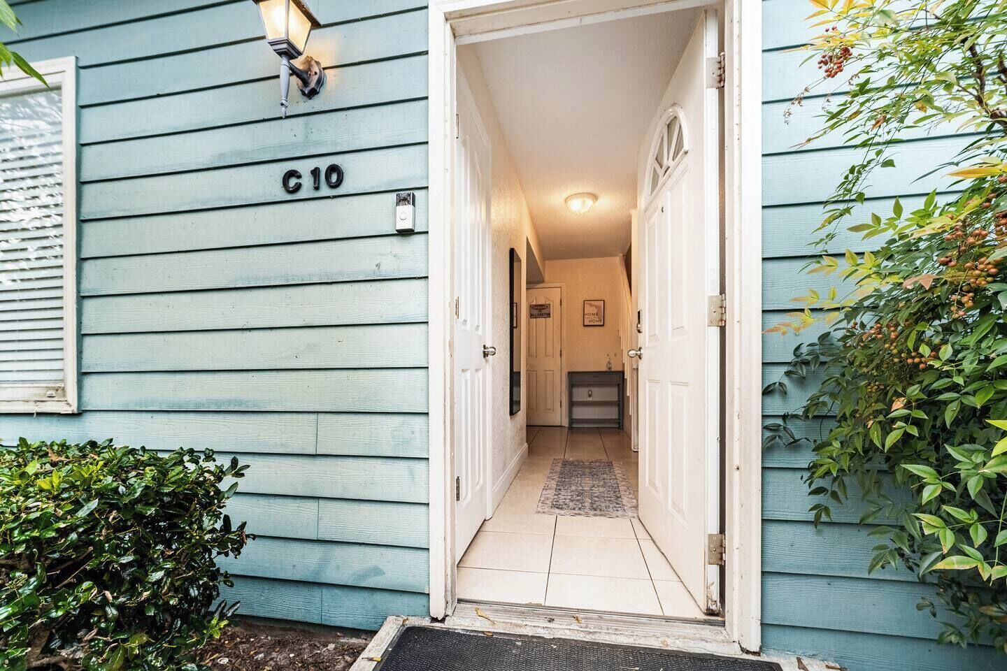 A hallway leading to a room with a door marked 'C10'.