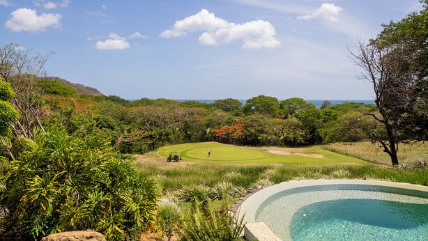 A golf course with a pool and lush greenery. - Beautiful luxury house in Guacalito de la Isla, Casa Kidd (Tola)