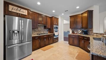 Coffee/tea maker, fridge, microwave, oven