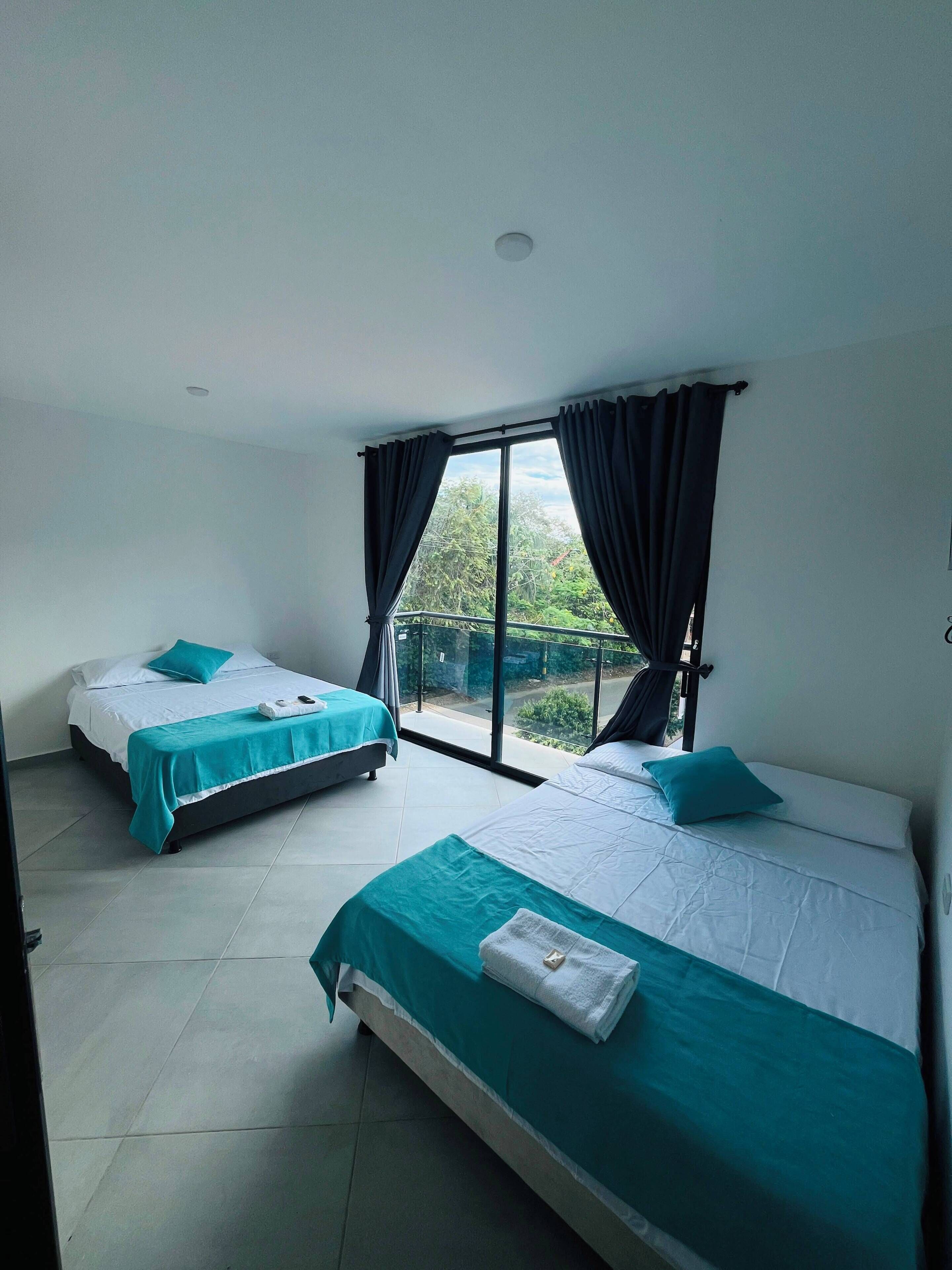Family Twin Room, Balcony, Garden View | Free WiFi, bed sheets