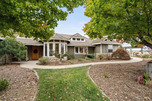 Custom Ranch style home with a Citrus grove and swimming pool on 12 acres.