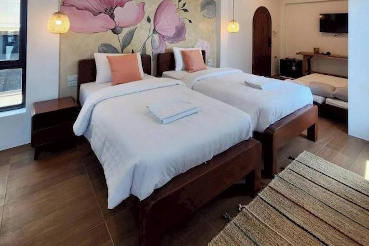 Deluxe Family Room | Desk, soundproofing, iron/ironing board, rollaway beds