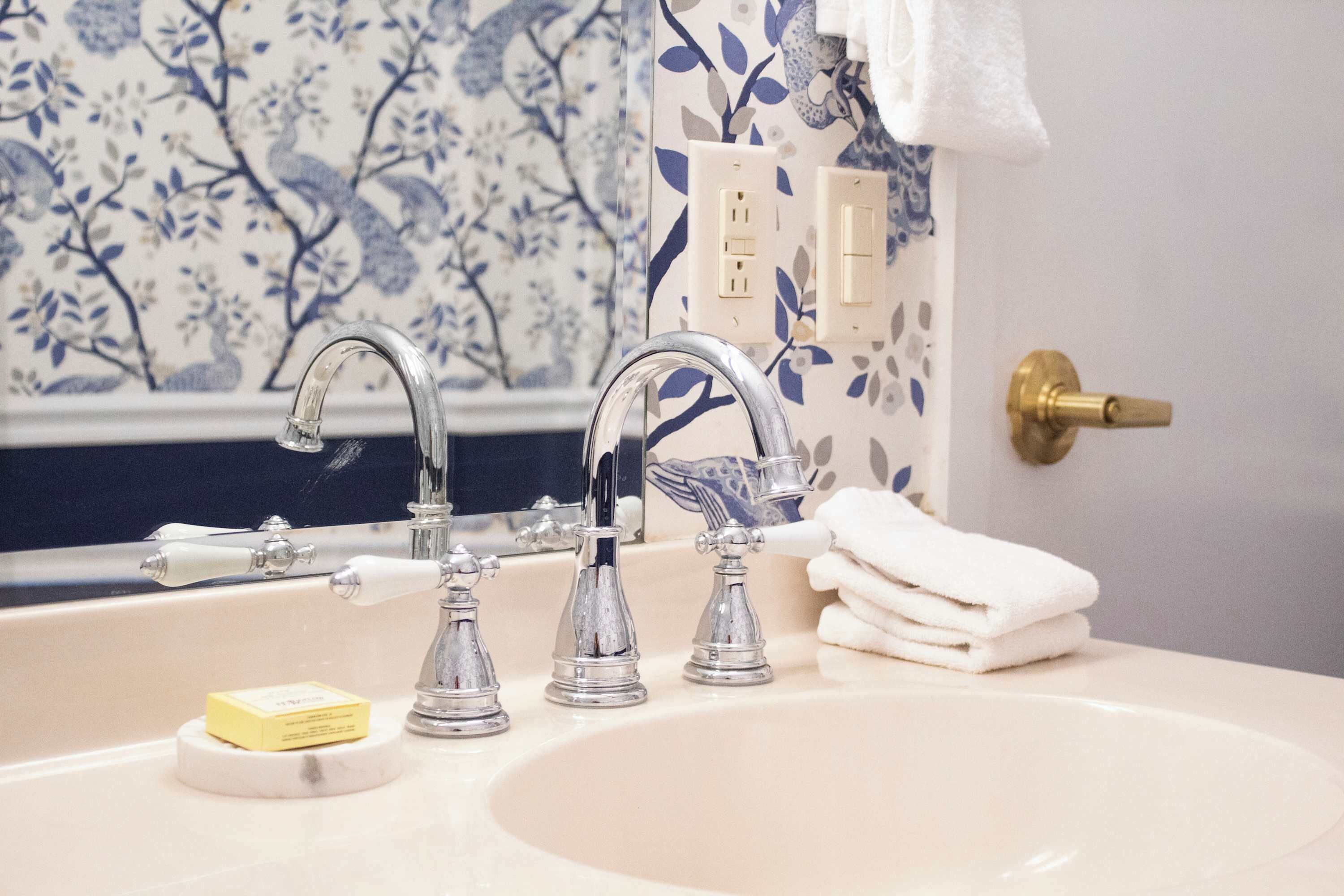 Shower, hair dryer, towels, shampoo