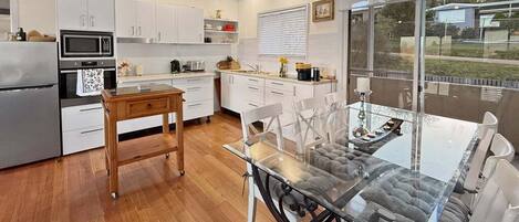 Coffee/tea maker, fridge, microwave, oven