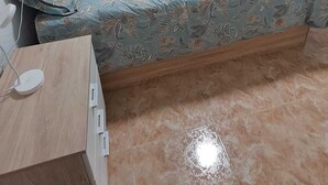A bedroom with a bed, a wardrobe, a desk with a lamp, and a door. - Your home in Altea! 200 m from the beach / bright / 2 bedrooms / fully equipped / beautifully decorated. (Altea)