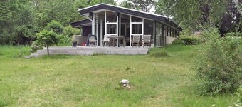 A Charming Vacation Home Gem: Outdoor Amenities on the Property and a Beach Nearby