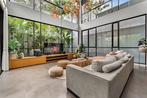 Villa, 5 Bedrooms, Pool View | Living area | 65-inch Smart TV with cable channels, Netflix, streaming services - Casanela Villa by Kozystay - Jimbaran (Badung)