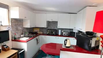 Mini-fridge, microwave, oven, stovetop