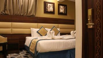 Premium bedding, memory foam beds, in-room safe, blackout drapes